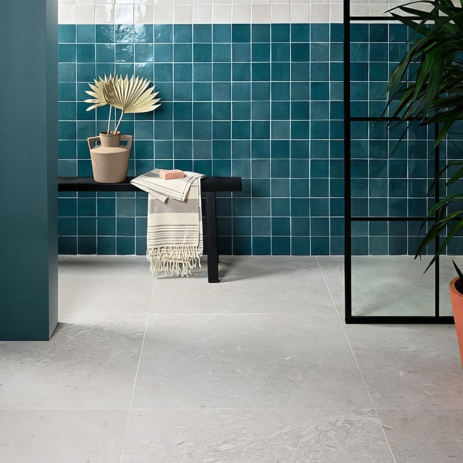 Teal glossy porcelain square tiles with white grout create a striking wall accent in tisbury 80 x 80cm size