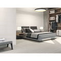 Modern gray upholstered tivoli 1828 bed with sleek low-profile frame and dark headboard for stylish bedroom use