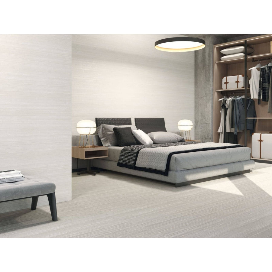 Modern gray upholstered tivoli 1828 bed with sleek low-profile frame and dark headboard for stylish bedroom use