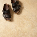 Black leather tivoli beige sandals with two adjustable metal buckle straps and a cork footbed 90 x 60cm