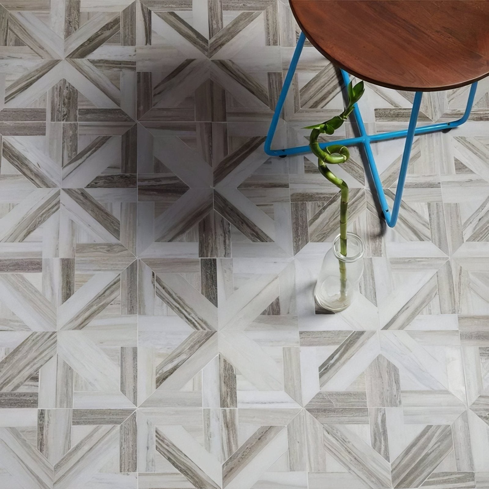 Geometric patterned floor tiles with a white and gray wood-grain design from tokyo lattice marble mosaic collection