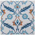 A topkapi red ceramic tile with intricate blue orange and white floral and vine patterns on helmingham