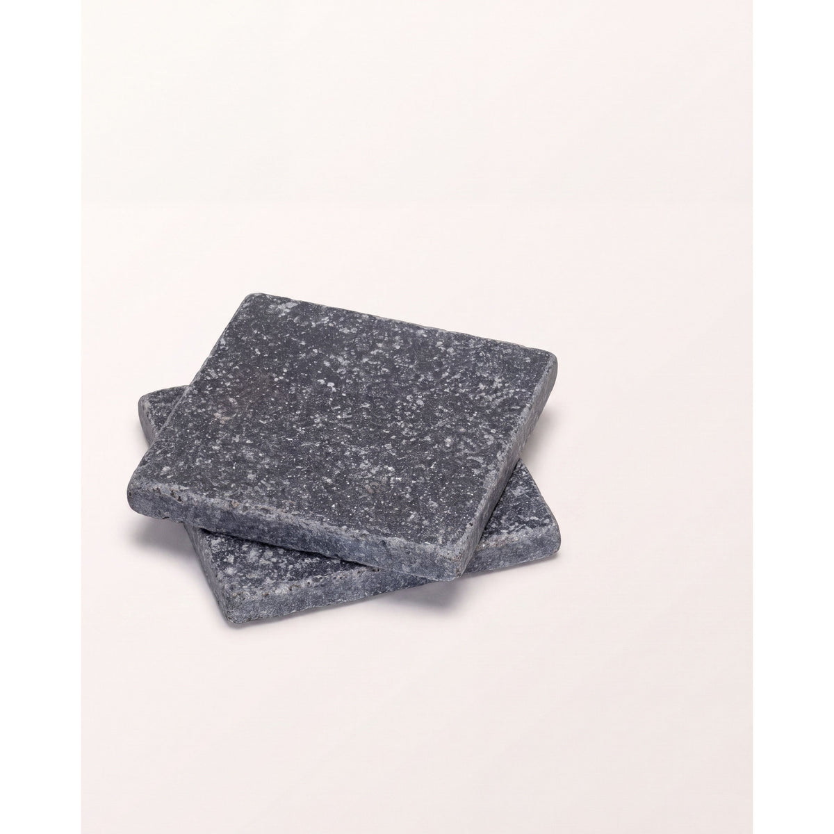 
Tora Blue Limestone tumbled cabochon, angled view