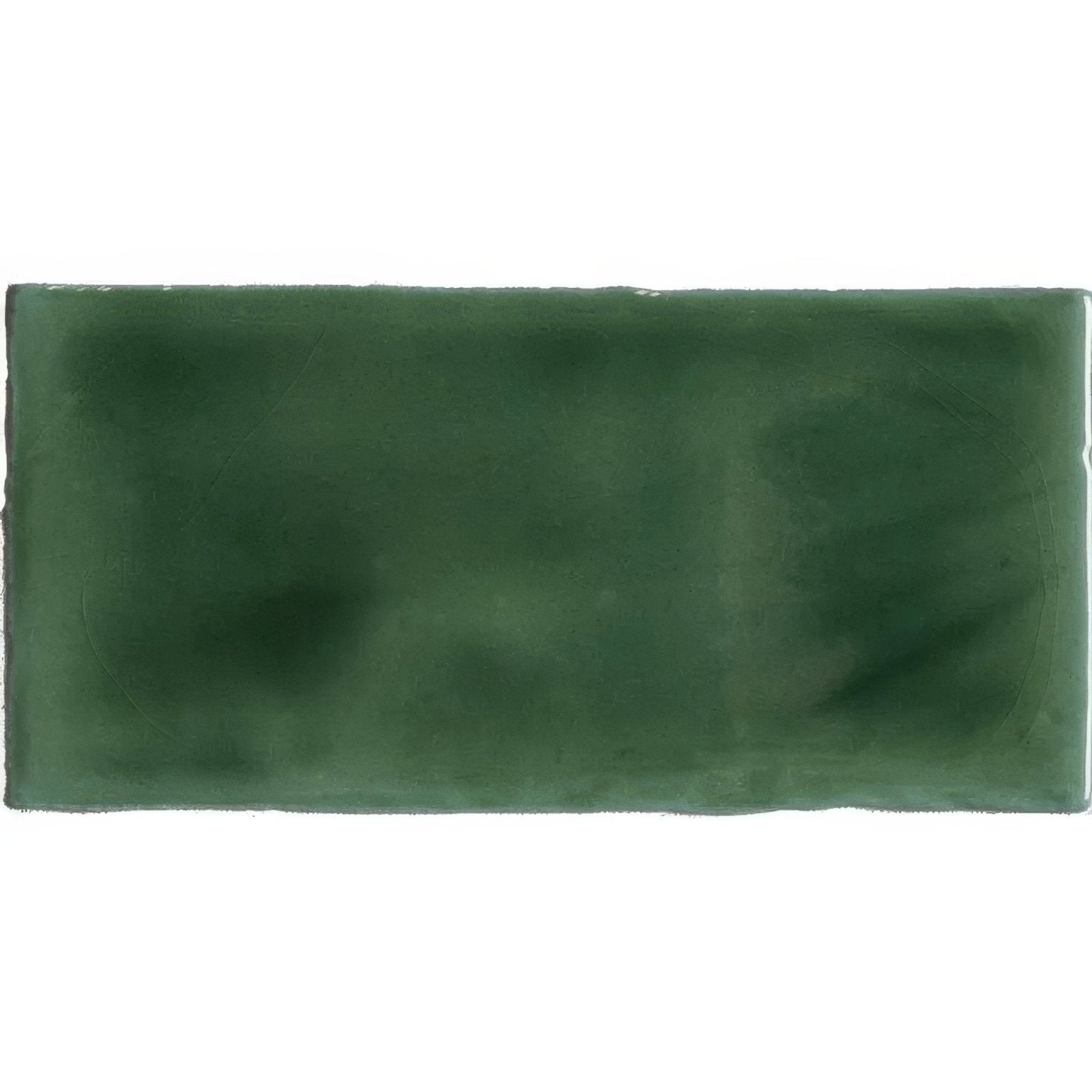 Tourmaline half tile wall tile featuring a rectangular matte dark green ceramic tile with subtle tone variation and texture