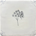 A square off-white ceramic tile with a delicate black ink illustration of flowers and a fly in traditional english delft bee style