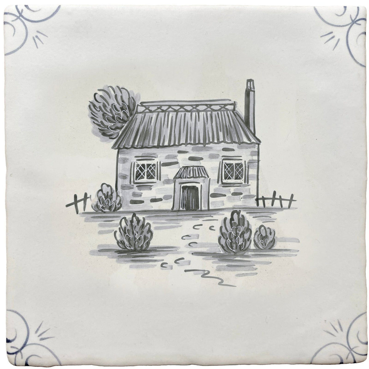 A square ceramic tile with a hand-drawn black ink illustration of a rustic stone cottage in traditional english delft style