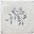 Traditional English Delft swift ceramic tile with hand-painted gray bird on floral branch on off-white background