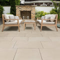 Beige rectangular trafalgar sandstone etched paving tiles with subtle grout lines for outdoor patios