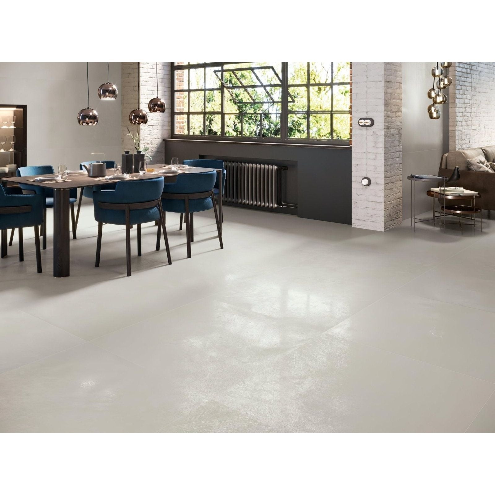 Smooth light gray polished concrete floor showing tribeca 1823 bone polished finish with subtle sheen
