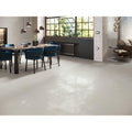 Smooth light gray polished concrete floor showing tribeca 1823 bone polished finish with subtle sheen