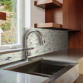 Trip Lluvia Beige Mosaic beige and silver glass mosaic with a chrome pull-down tap