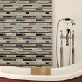 Trip Timber Beige Mosaic olive, brown and black glass mosaic with a chrome bath tap
