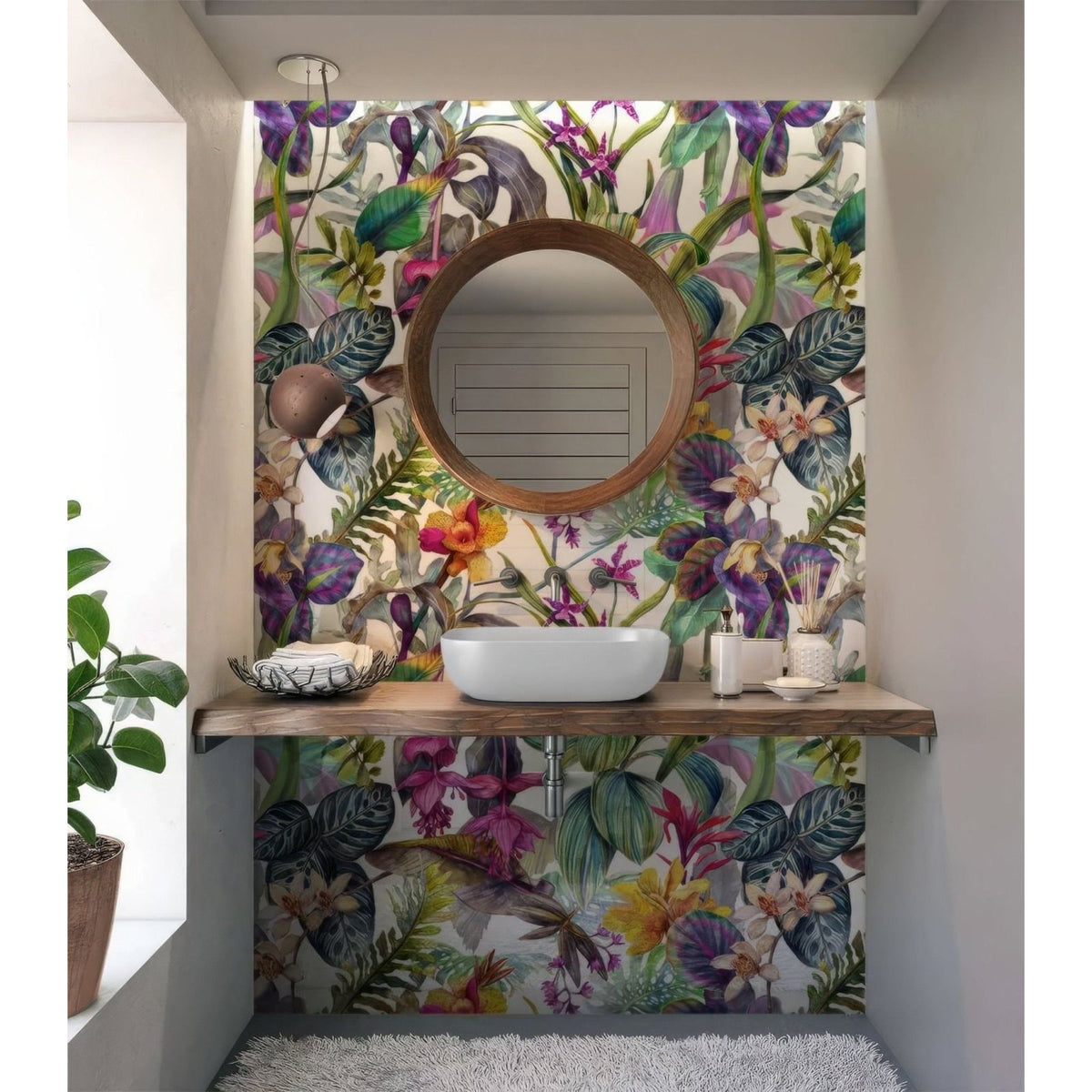 Round wooden-framed mirror with natural finish above sink complementing tropical floral dream shower wall panel