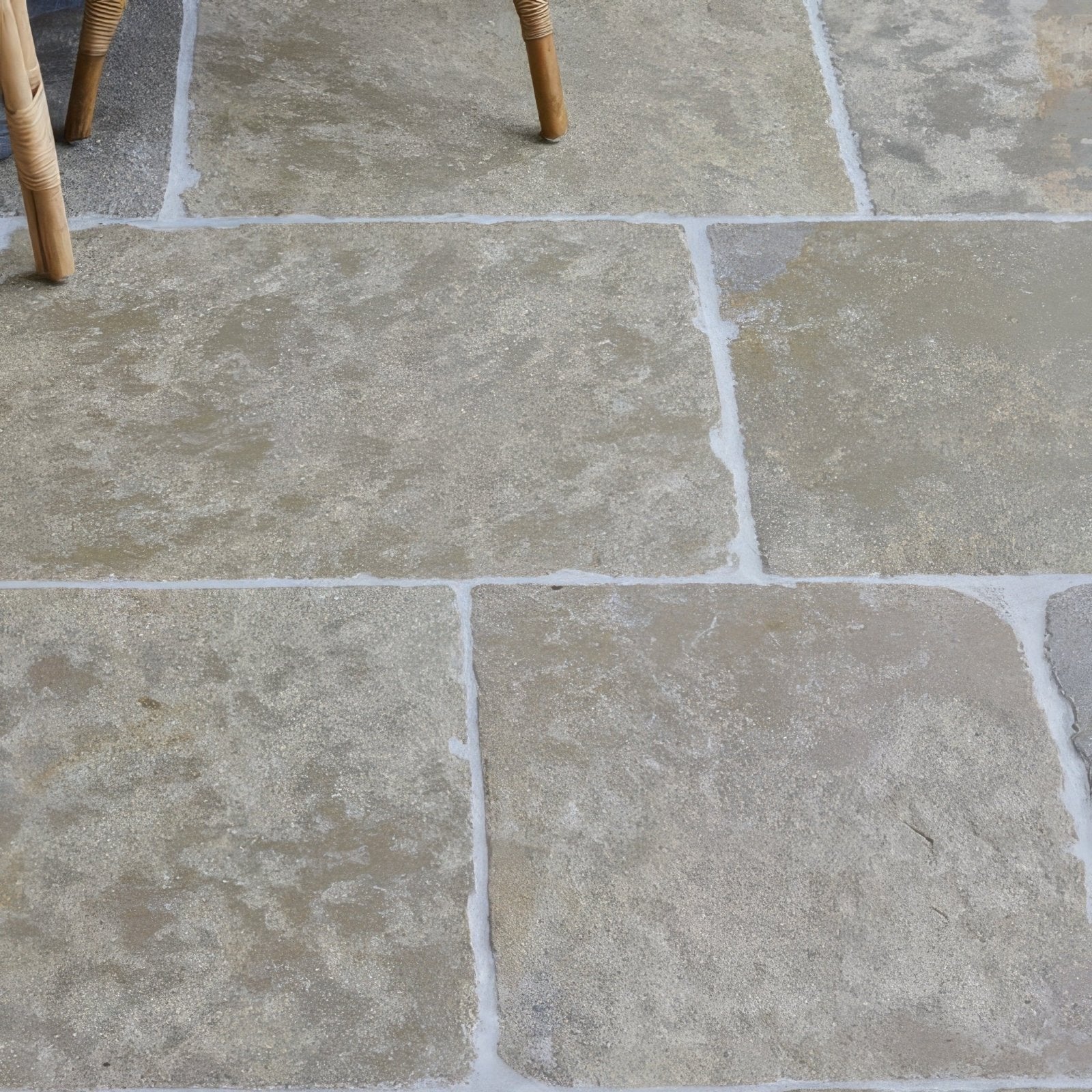 Beige trusloe limestone paving with a seasoned finish featuring natural textured stone tiles and subtle tone variations