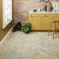 Herringbone patterned trusloe limestone seasoned finish parquet floor tiles in warm beige and muted gray tones