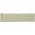 A rectangular off-white ceramic tundra brick tile with a textured uneven surface and subtle speckles