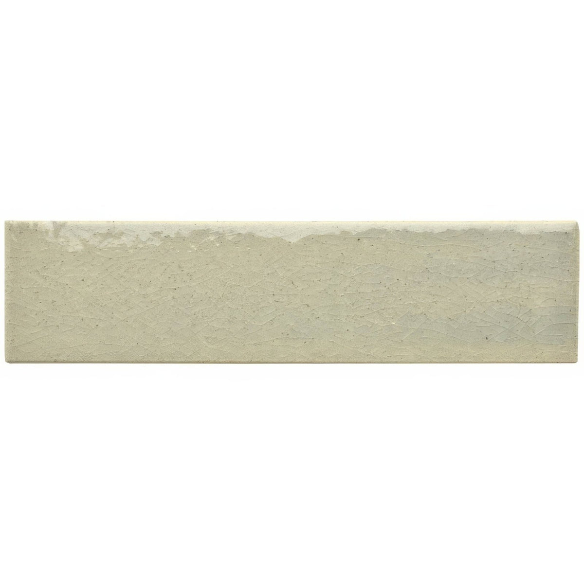A rectangular off-white ceramic tundra brick tile with a textured uneven surface and subtle speckles