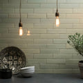 Tundra brick tile light green rectangular subway tile wall with matte finish and visible grout lines