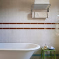 White porcelain clawfoot bathtub tunstall ceramic deep white square with smooth curved edge and classic vintage design