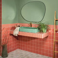 Tunstall Ceramic Fluted Brick Coral in a bathroom setting (2)