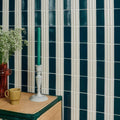 Tunstall ceramic fluted brick deep white with deep teal and off-white vertically ribbed ceramic tiles striped wall pattern