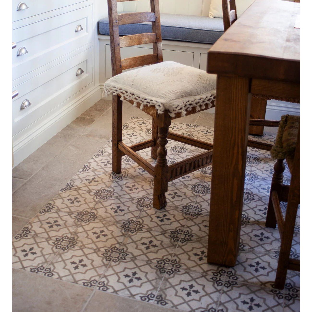 Urban callizo patterned porcelain tile featuring intricate geometric designs in muted gray and beige tones on floor