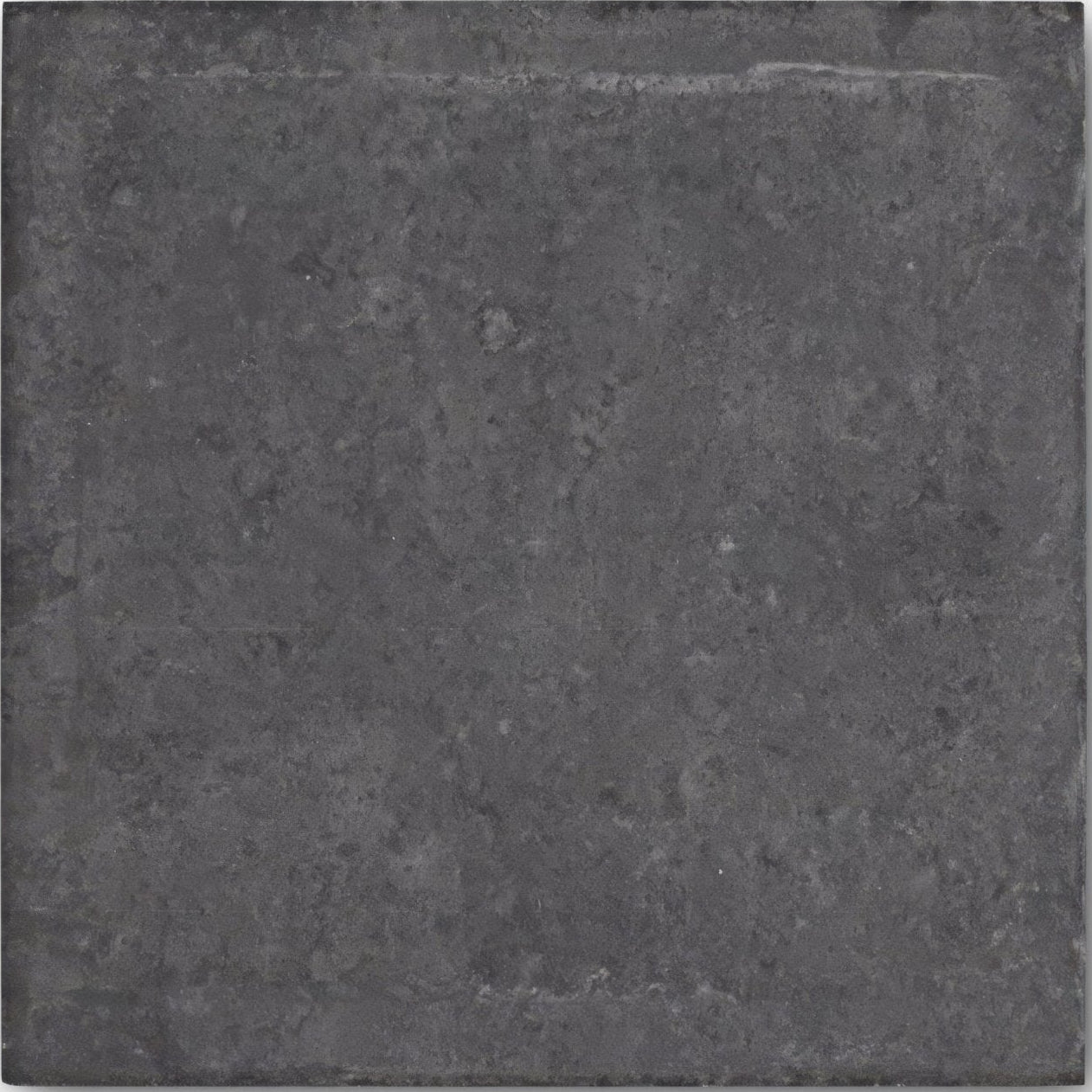 Urban charcoal plain porcelain tile featuring dark gray stone texture with subtle tone variations and a slightly uneven surface