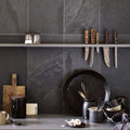 Dark gray marble-effect urban slate 40 x 40 black grey kitchen backsplash with subtle veining and matte finish