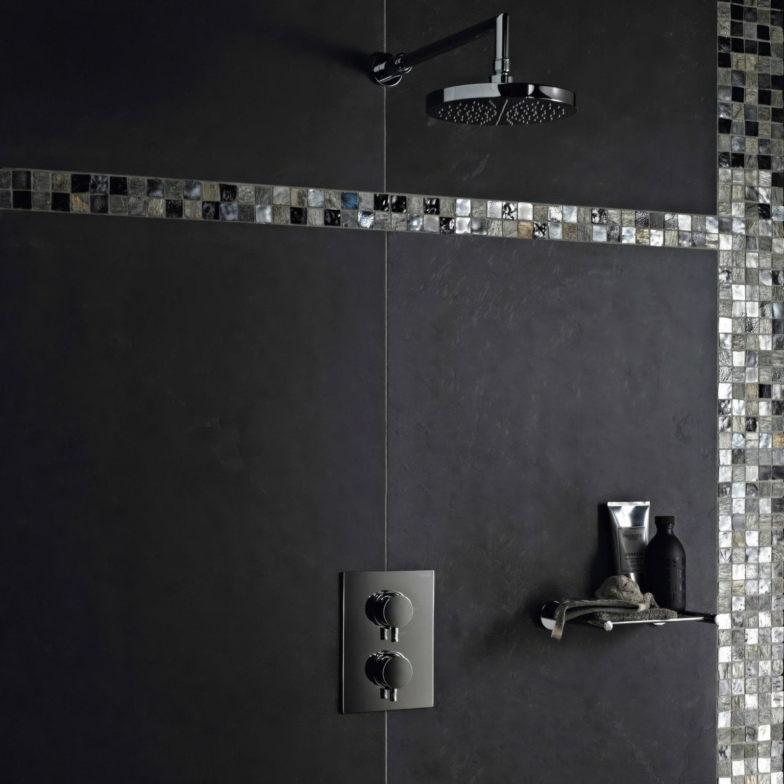 Modern chrome finished showerhead with sleek circular design and multiple spray holes for urban slate 60 x 60 black grey tile