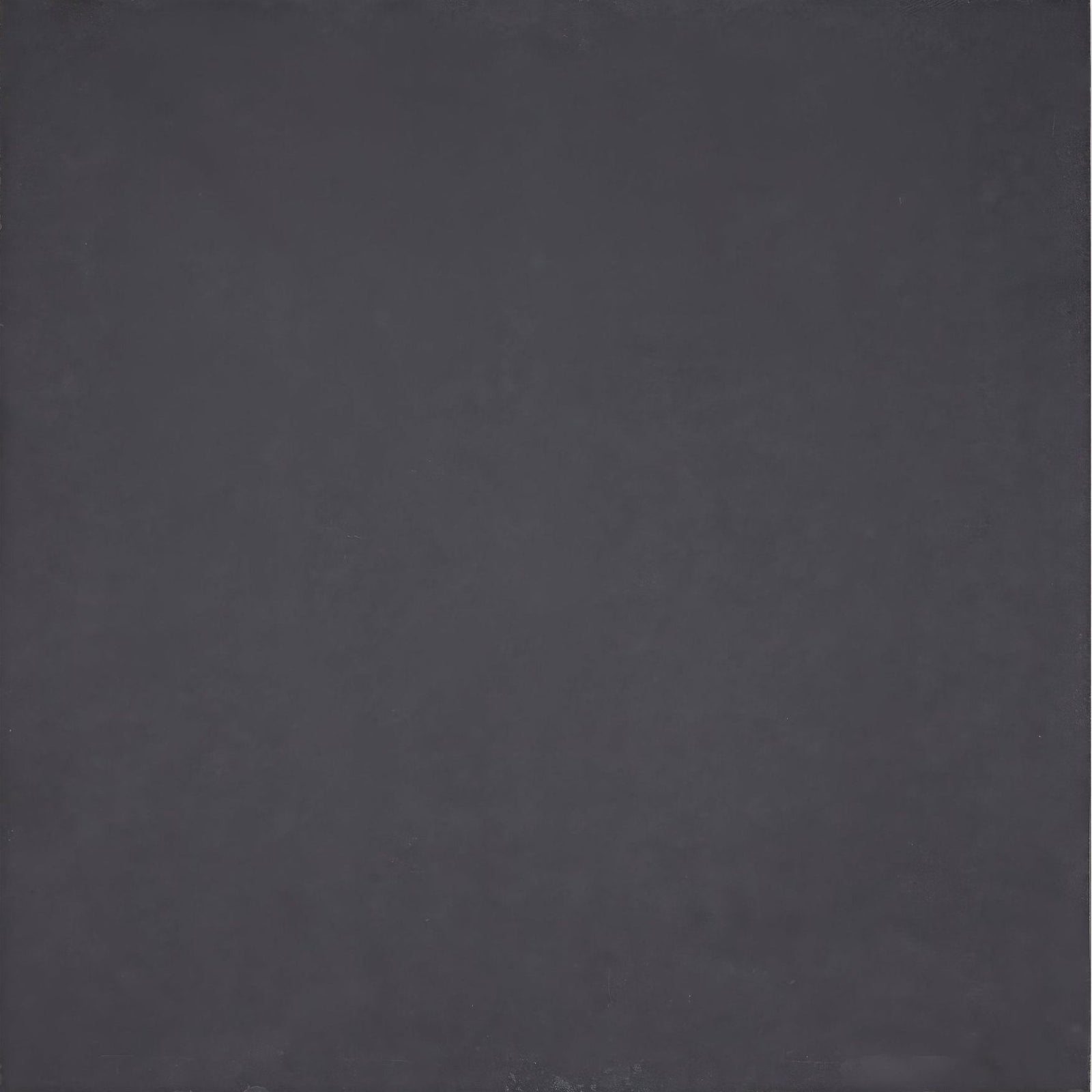 Urban slate 60 x 60 black grey tile with solid black textured surface ideal for modern flooring and wall applications
