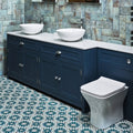 Navy blue bathroom vanity Vacation Porcelain Cordoba with white marble countertop and two white vessel sinks