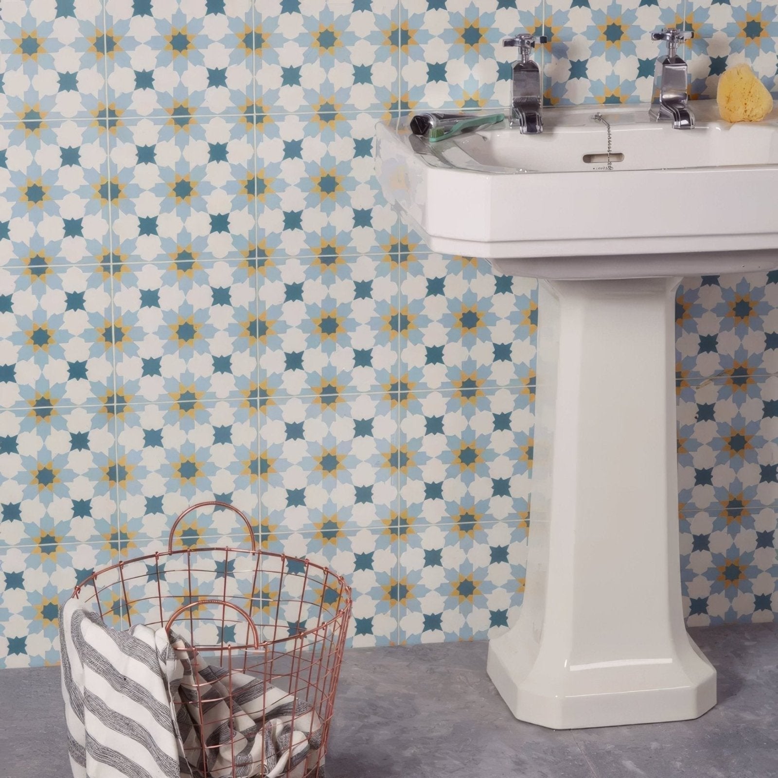 White porcelain vacation tangier pedestal sink with chrome faucets ideal for bathroom use