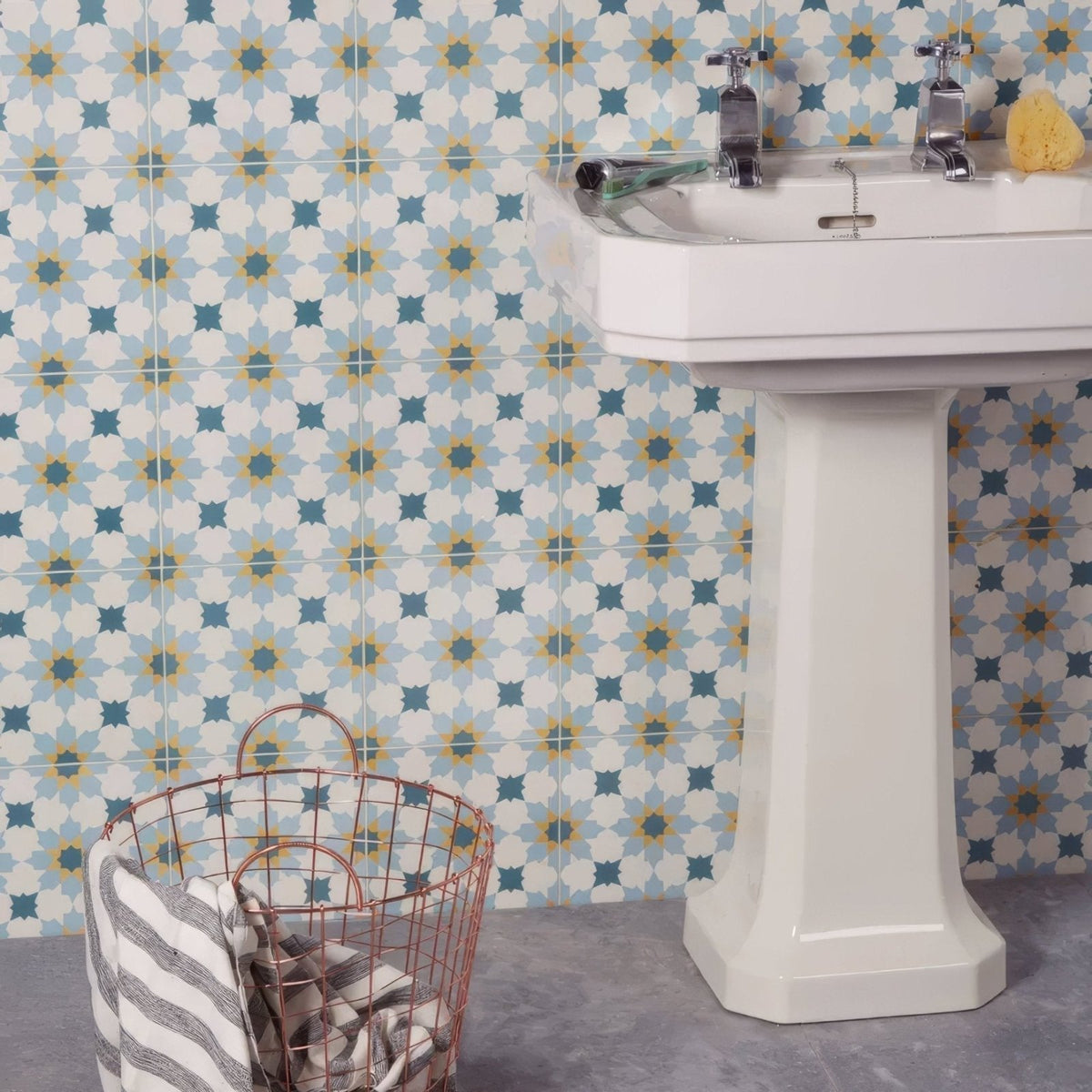 White porcelain vacation tangier pedestal sink with chrome faucets ideal for bathroom use