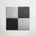 Venetian black 20 x 20cm black and white marble tiles arranged in a four-square checkerboard pattern