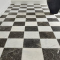 Venetian black 40 x 40cm black and white marble tiles arranged in a classic checkerboard pattern