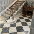 Venetian black and white marble checkerboard tiles with a staircase