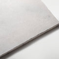 Venetian white 40 x 40cm light gray stone tile with a subtly textured natural surface and irregularly cut edges