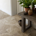 Beige marble-effect floor tiles with subtle veining and a matte finish in versailles marble brun honed style