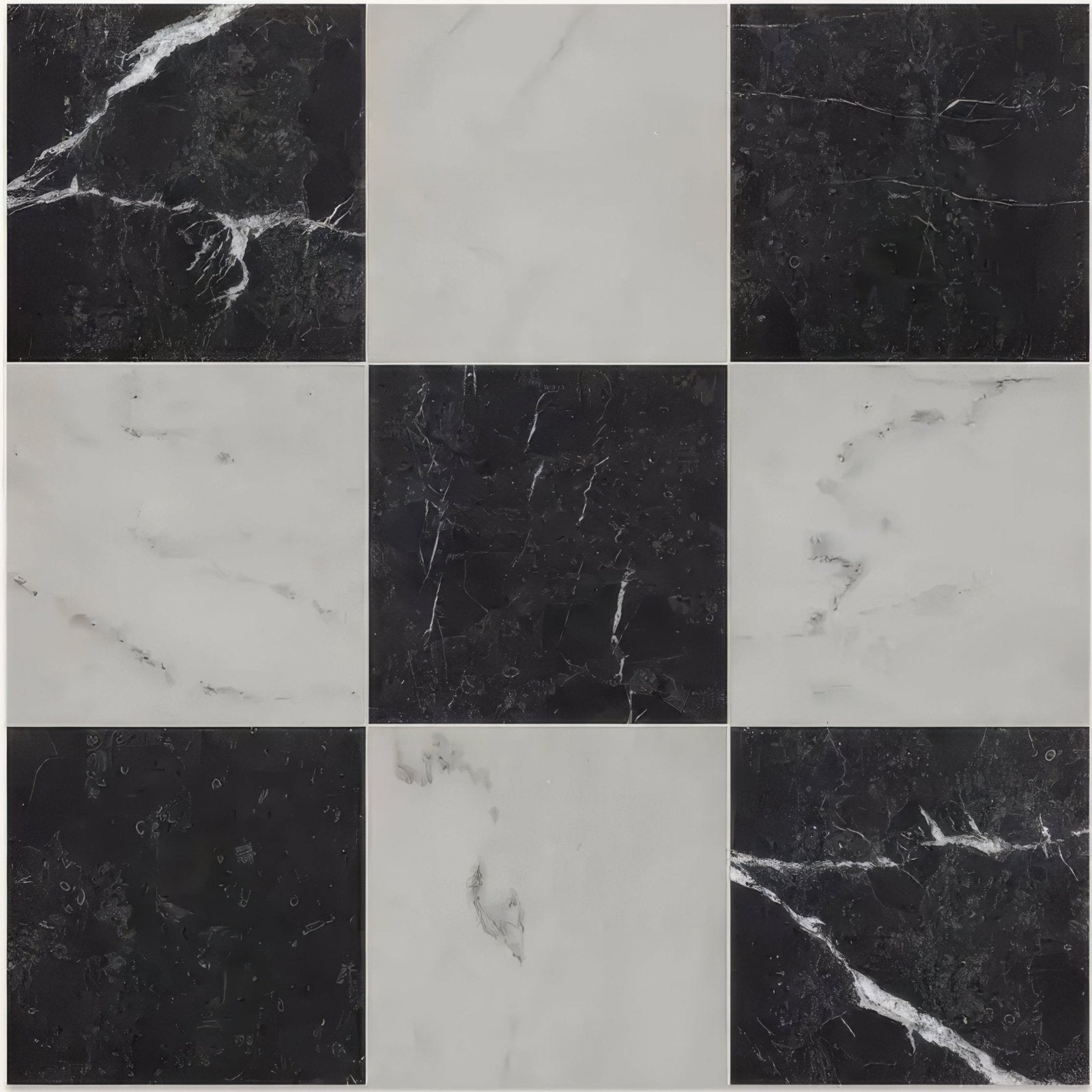 Black and white marble tiles with elegant veining patterns in versailles marble noir honed finish