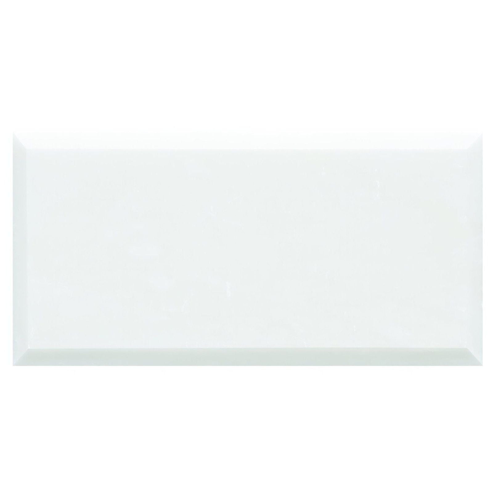 A sleek glossy white viano white honed bevelled marble tile with subtle sheen and clean beveled edges 200 x 100mm