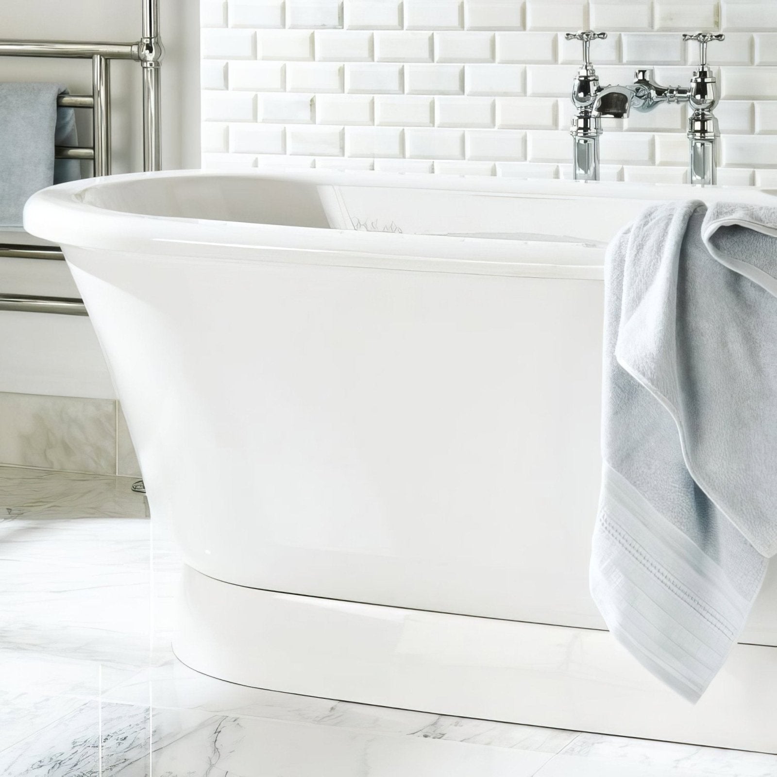 White freestanding bathtub with sleek curved design and polished chrome fixtures featured in Viano white polished bevel marble 200 x 100mm