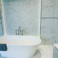 Victorian Diamond Marmara Mirror Mosaic diamond mirror mosaic with a white freestanding bathtub