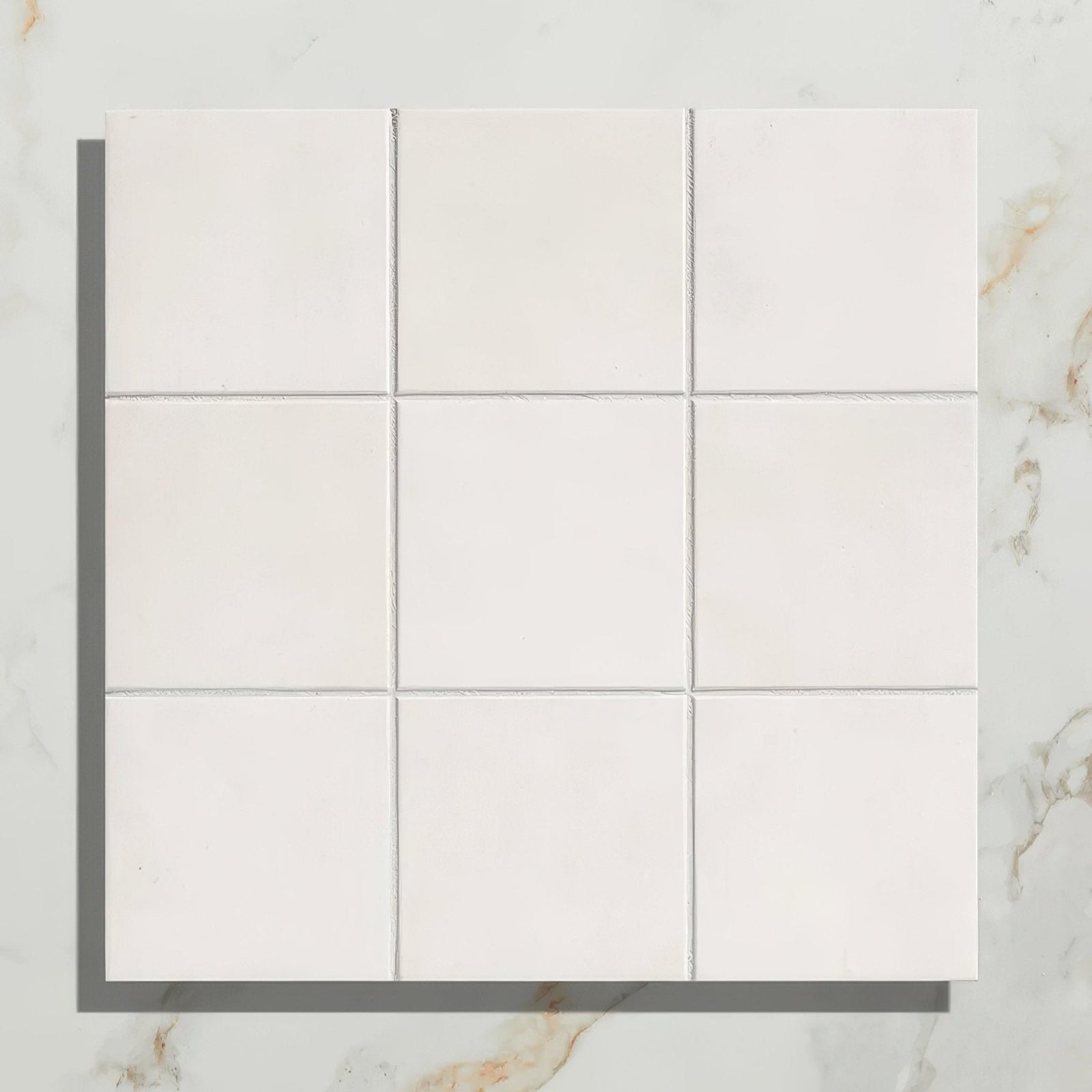 Nine square white ceramic tiles in a grid pattern from victorian style porcelain cotton white field collection