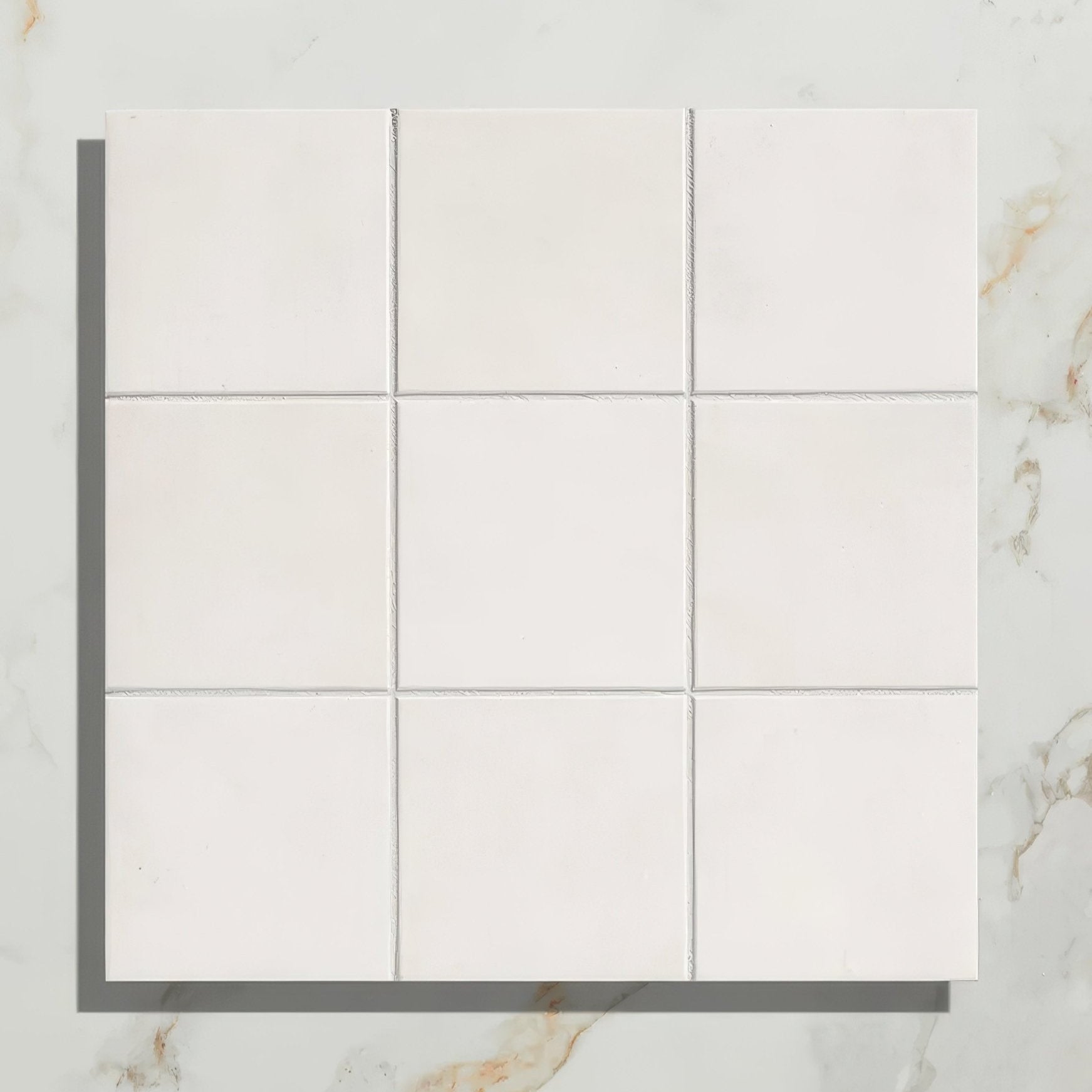 Nine square white ceramic tiles in a grid pattern from victorian style porcelain cotton white field collection
