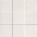 Victorian style porcelain cotton white field white square ceramic tiles arranged in a grid pattern