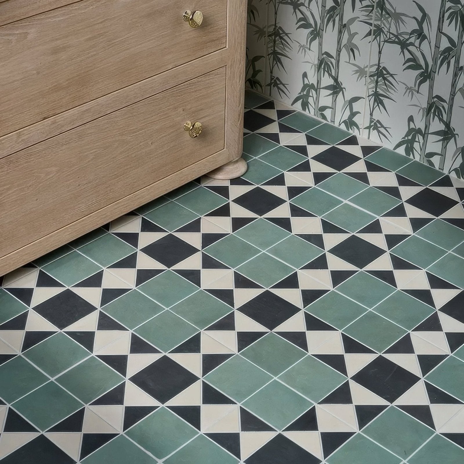 Victorian style porcelain finchley pattern floor tiles with geometric diamond design in forest green black and cream accents