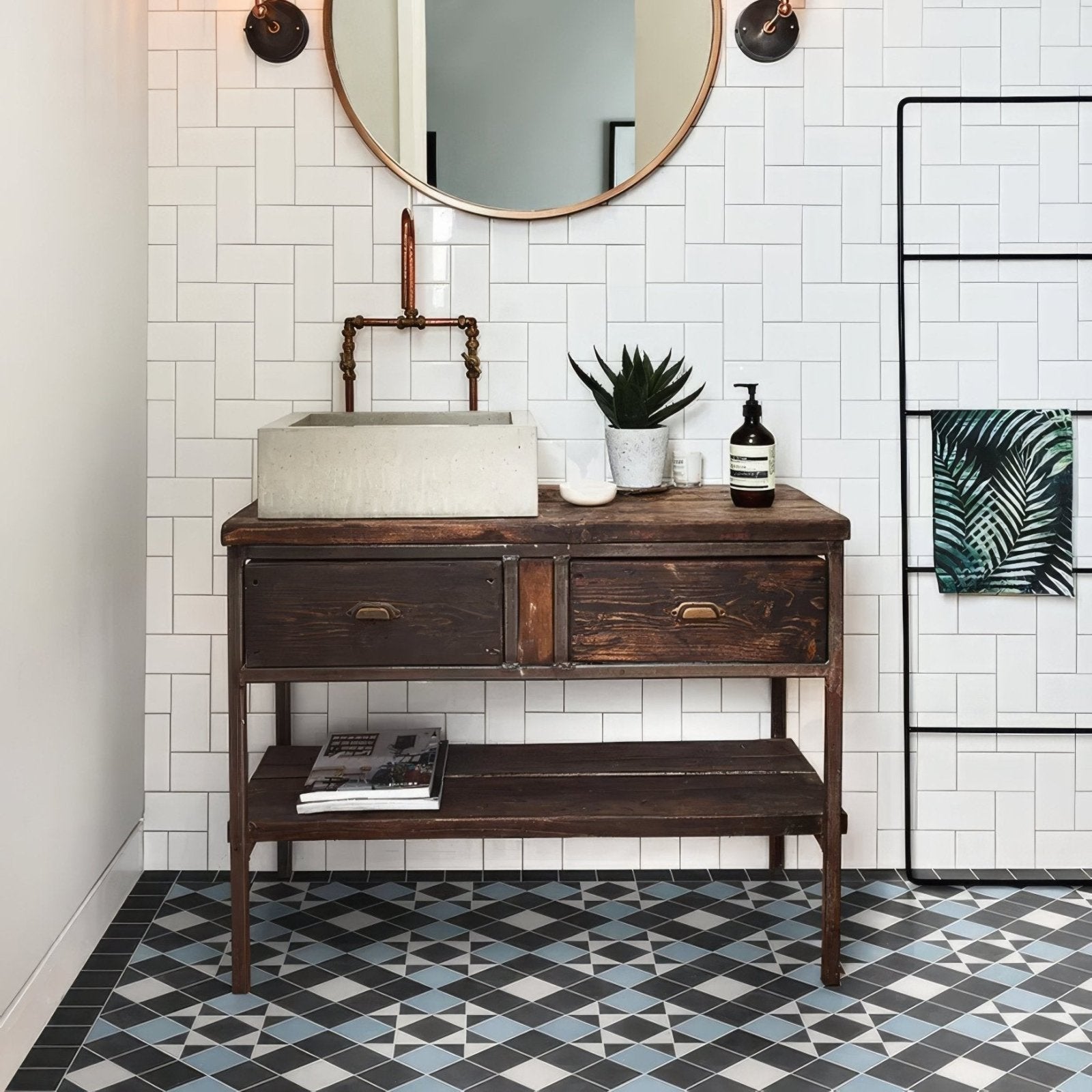 Victorian Style Porcelain Finchley Pattern Sky Blue blue geometric tiles with a dark wood vanity and concrete sink
