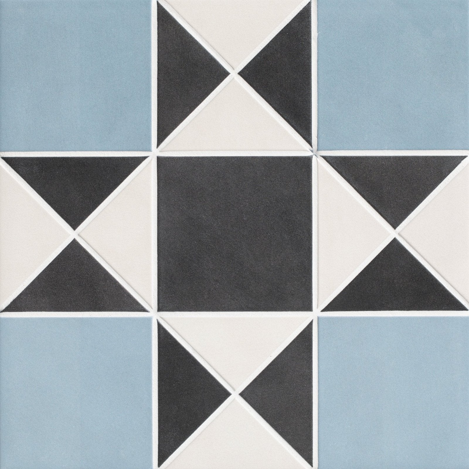 Victorian style porcelain floor tile in finchley pattern featuring blue black and white geometric design