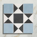 Victorian style porcelain tile featuring a blue black and white star-like finchley pattern for decorative use