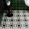 Victorian style porcelain finchley pattern floor tiles with black and white classic diamond geometric design in soft grey
